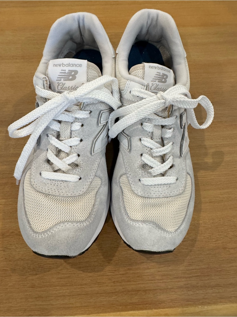 New Balance women’s light Gray & White Classic Sneakers